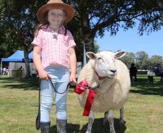 Glenham’s Mackenzie Maxwell and Chugzy won a red ribbon in the children’s under-6 pet lamb...