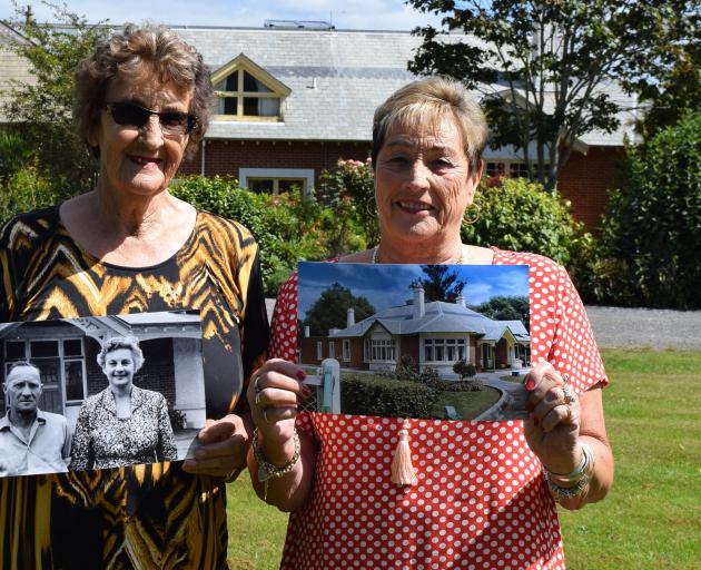 Patricia Snell and Joan King hold  photos of their parents Percy and Rita Birley, who managed  ...