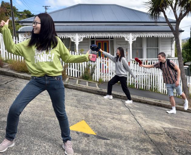 Lei Zhou (left) and Ting Chen, both of China, and Flynn Mankelow, of Oamaru, see the sights of...