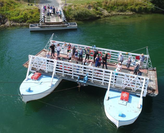 Visitors to the Picnic at the Punt Tuapeka Mouth Punt 125th jubilee yesterday celebrate with a...