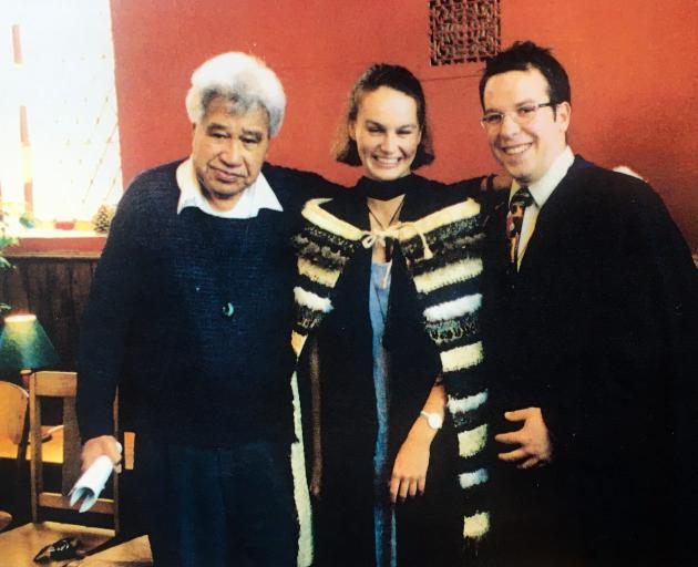 Poet Laureate, Hone Tuwhare, (left) with University of Otago graduates
...