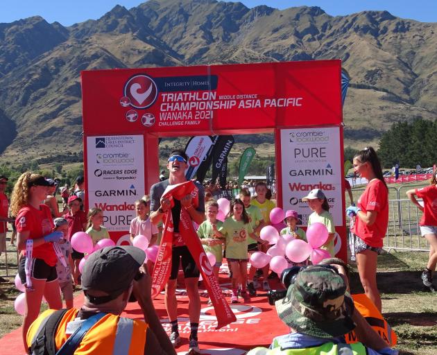 Challenge Wanaka half winner Kyle Smith enjoys the moment on Saturday morning. PHOTO: KERRIE...