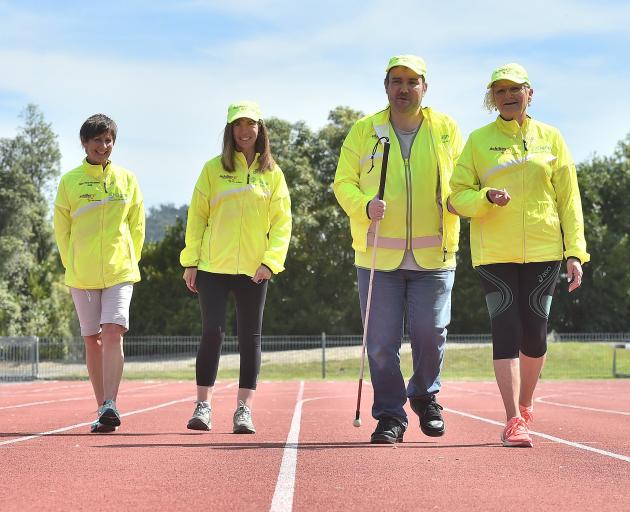 In training at the Caledonian Ground in Dunedin yesterday are (from left) Achilles International...