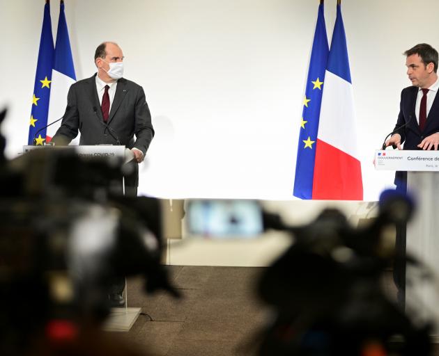 French Prime Minister Jean Castex and French Health Minister Olivier Veran deliver a news...