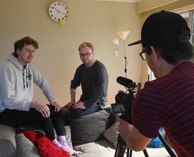 Friends (from left) Toby Stoddart and Tenson Dalby are filmed by Jamie Farmer for their entry in...