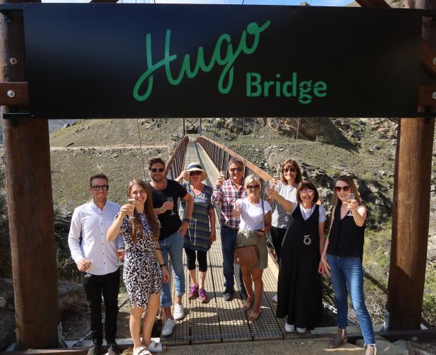 Raising their glasses to the Hugo Bridge are (from left) Scotty Blythen (Hugo friend), Kayleigh...