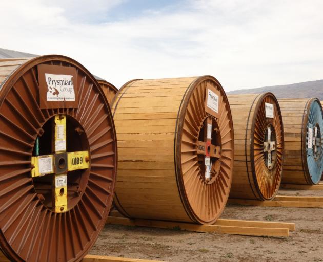Reels each holding 3.2km of aluminium and galvanised steel conductor cable stored at a yard near...