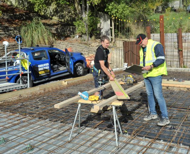 Dunedin carpenter Malcolm Hill (left) and Fahey Kwiat Builders director Jon Kwiatkowski at a work...