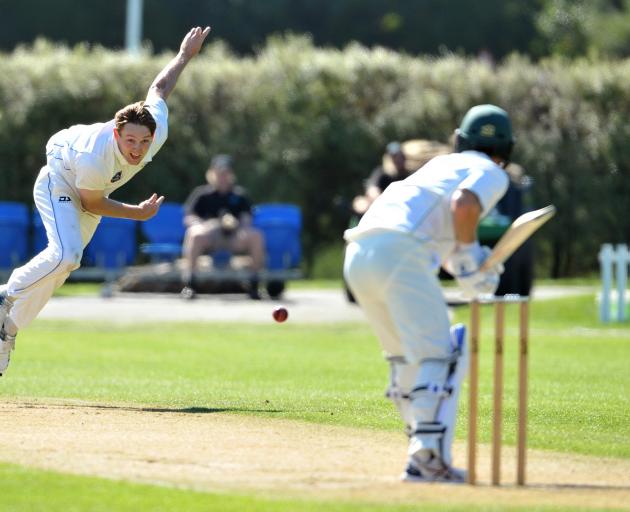 Otago’s Angus McKenzie bowls to Greg Hay on the last day of the Plunket Shield match between ...