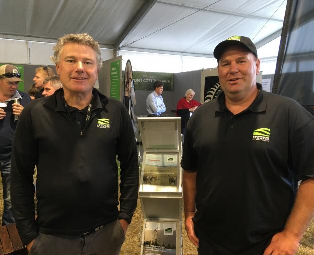 Federated Farmers North Canterbury territory manager Harry Matthews (left) chats to national...