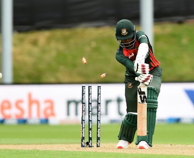 Hasan Mahmud is cleaned up by Trent Boult during Bangladesh's disappointing batting innings....