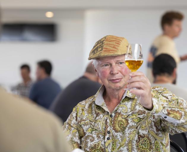 Grenville Caughey  judges a beer at the New World Beer & Cider Awards in Christchurch last week....