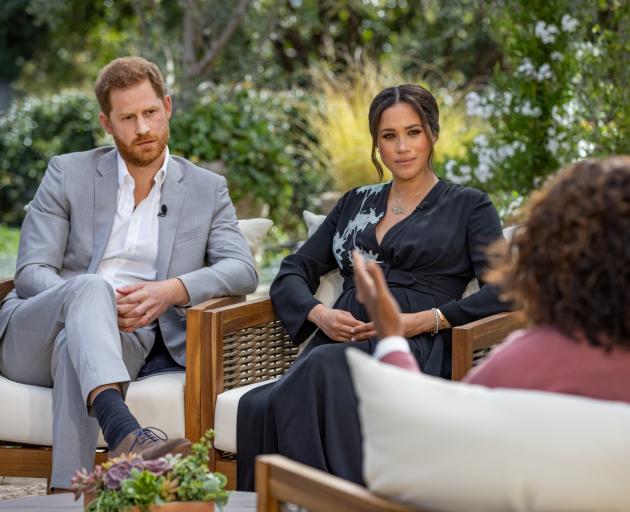 Prince Harry and Meghan, Duchess of Sussex, are interviewed by Oprah Winfrey. Photo: Harpo...