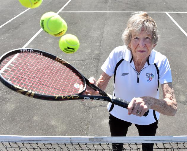 Dunedin tennis player Jean Stevens with the tools of her trade at the St Clair Tennis Club courts...