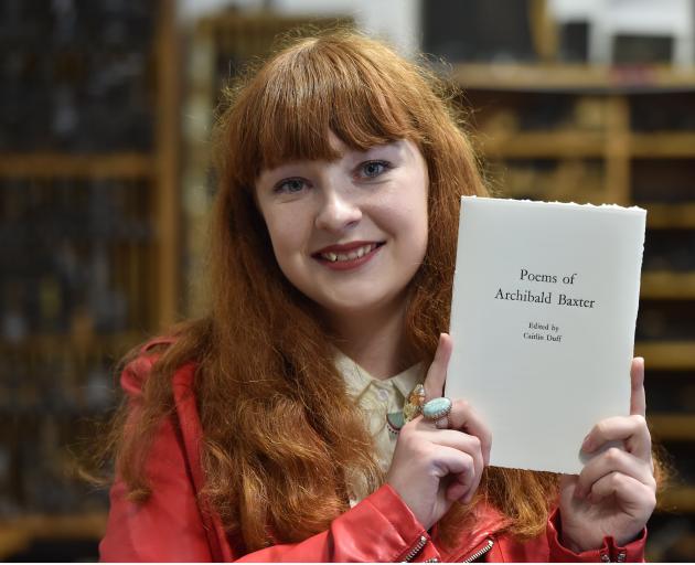 University of Otago student Caitlin Duff (19) holds a book of poems by Dunedin conscientious...