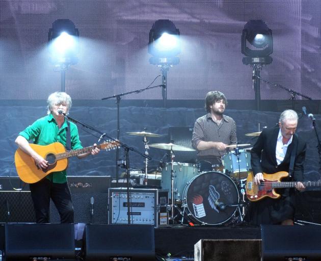 Performing at their concert at Gibbston Valley Winery on Saturday are (from left) Crowded House...