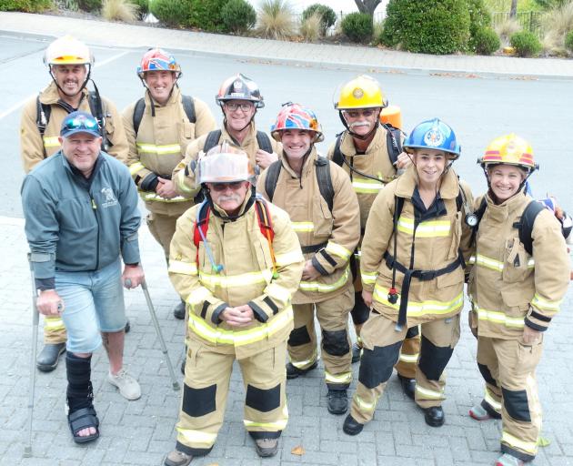 Pictured before the start the ‘‘March March’’ up Queenstown Hill on Saturday are (back, from left...