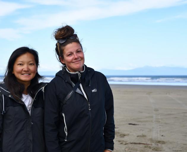 French travellers Caroline Ly and Oaianne Lelay visited an Invercargill beach yesterday morning,...
