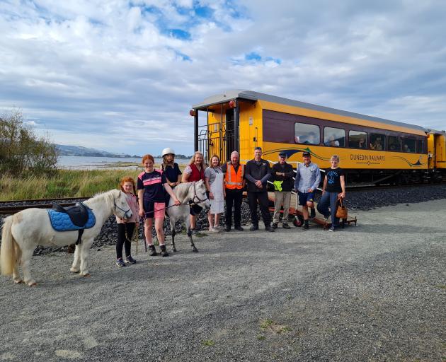 Farewelling the final Seasider train from Waitati for the summer are (from left) Warrington...