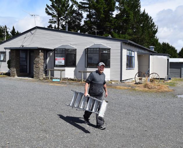 Clarks Junction Cafe Bar co-owner Tony Bennett renovates his new business between Outram and...