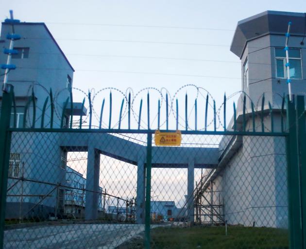 A perimeter fence around what is officially known as a vocational skills education centre in...