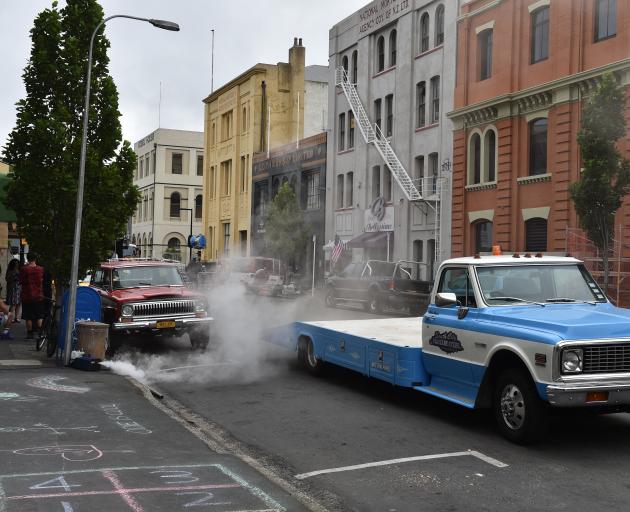 A smoke machine is activated on the film set in Vogel St.