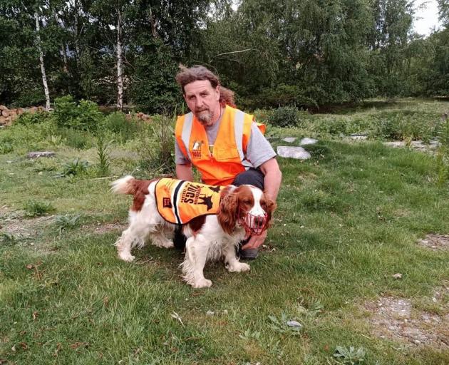 Billy Barton with Bongo Fury, one of his two feral cat hunting and tracking dogs. PHOTOS: KERRIE...
