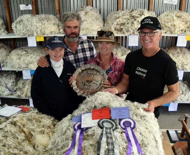 Inspecting their grand champion winning entry in the fleece pavilion at the Wanaka A&P Show on...