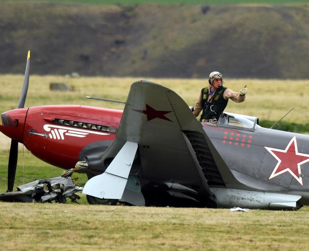Arthur Dovey signals he's OK after the collision. Photo: Stephen Jaquiery
