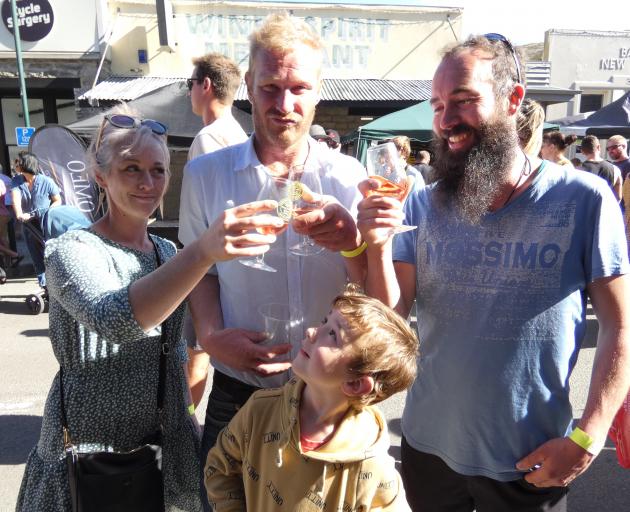 Toasting the Clyde Wine and Food Festival yesterday are (from left) Amy and Brad Mason, of...