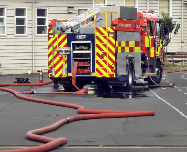 Emergency services respond to a suspicious fire at Bathgate Park School, in Macandrew Rd, South...