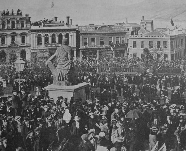 A jubilant crowd estimated at 30,000-40,000 throngs Dunedin’s Octagon, on May 18, 1900, following...