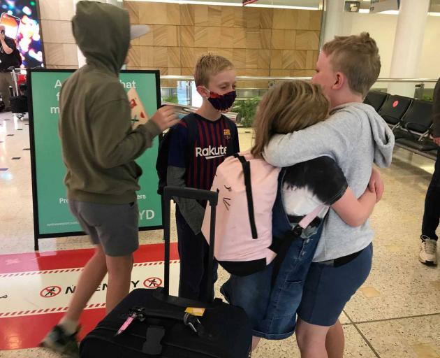 Cousins Milly and Lucas reuniting with Ben and Sam in Sydney. Photo: Sophie Trigger