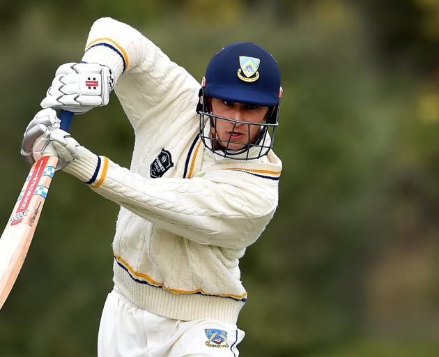 Otago batsman Max Chu watches the ball off his bat during the first innings of his side’s Plunket...