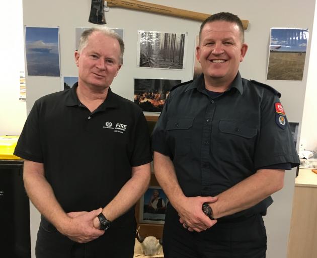 Fire and Emergency New Zealand North Canterbury principal rural fire officer Bruce Janes (left),...