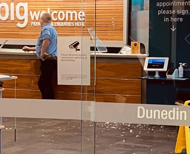 Smashed glass at council's office this morning. Photo: Craig Baxter 