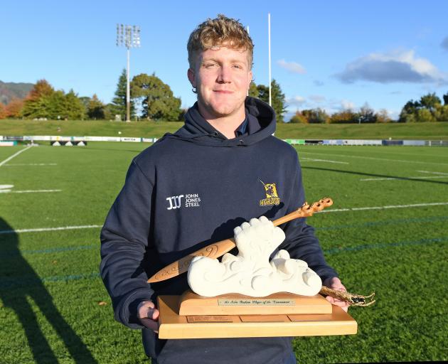 Sean Withy with the trophy he won for being the player of the tournament at the under-20...