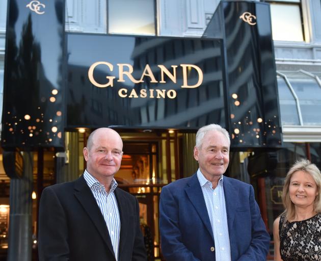 Outside the rebranded Grand Casino in Dunedin are (from left) director Peter Treacy, chairman...