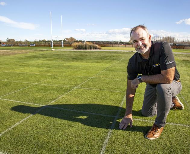 Turf expert Mark Shaw gets down to earth with a grid pattern of grasses at PGG Wrightson Seeds...