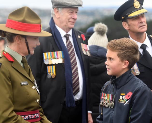 New Zealand Defence Force Colonel Kate Lee speaks to Tahuna Normal Intermediate School pupil Josh...