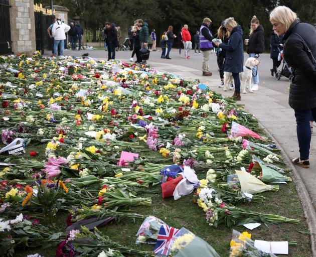 Flowers have been left at Windsor Castle by people offering their condolences to the royal family...