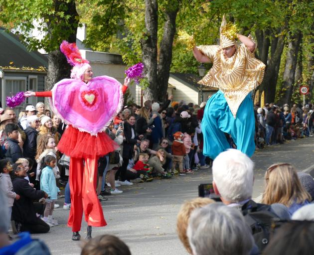 Stilt walkers entertain the thousands of people who gathered on Saturday for the 36th Arrowtown...