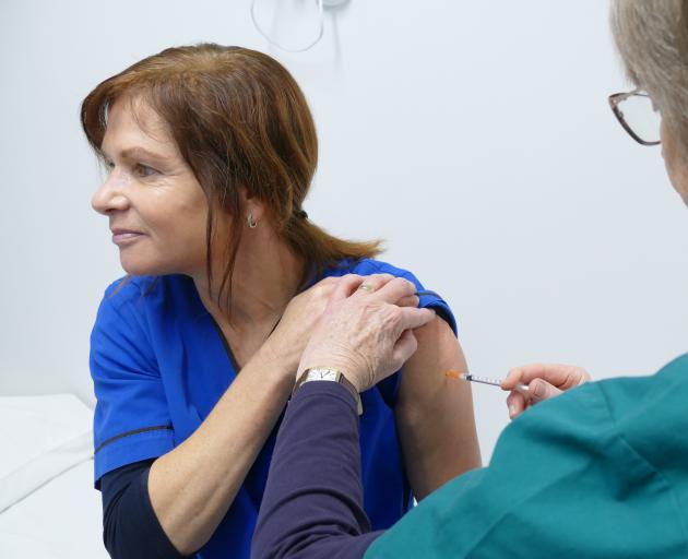 Queenstown Medical Centre nurse Suzie Hilton receives her first Covid-19 vaccination from...