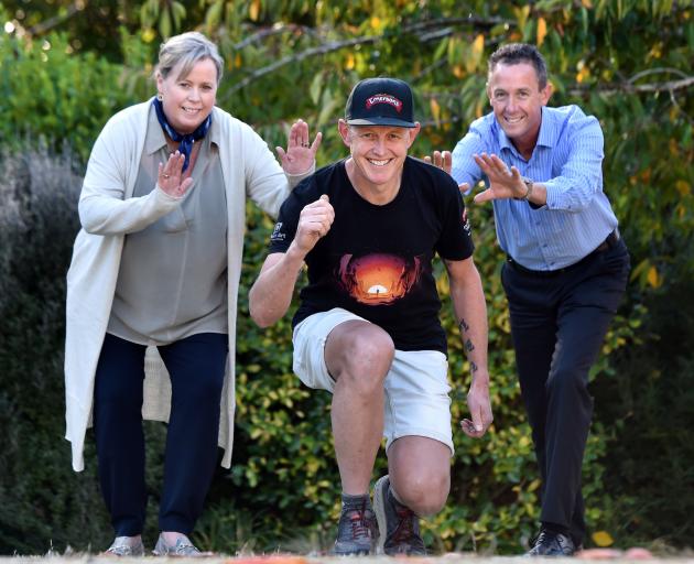 Dunedin ultra-marathon runner Glenn Sutton (47, centre) prepares yesterday for his longest...