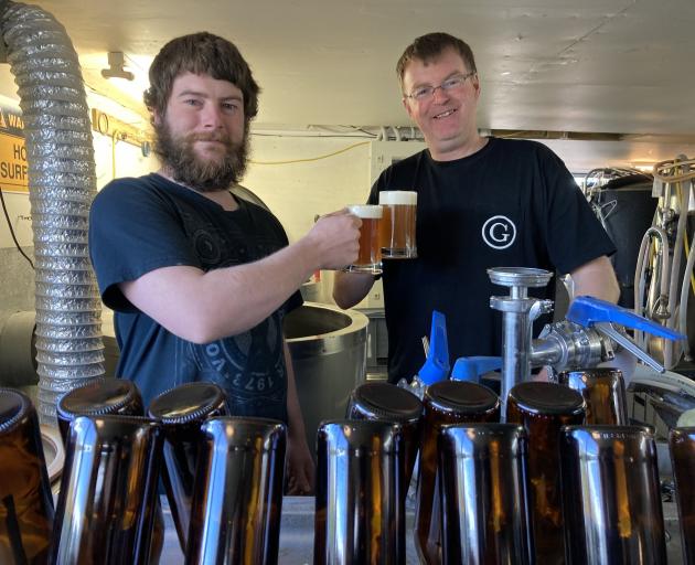 Catlins Brewery co-owner Norm Macleod with apprentice brewer Jeff Bray, on work placement from...