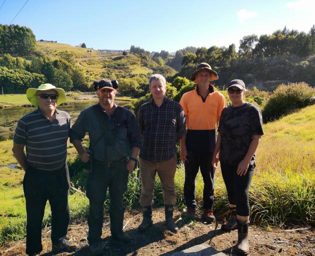 Otokia Creek and Marsh Habitat Trust members and volunteers (from left) Colin Astle, Matthew York...