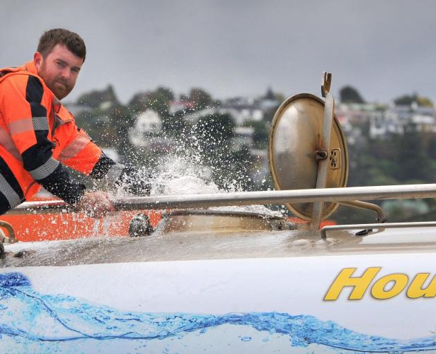 H.A. Foote Haulage driver Ash Rogan fills up another tank of water in Midland St, Dunedin,...