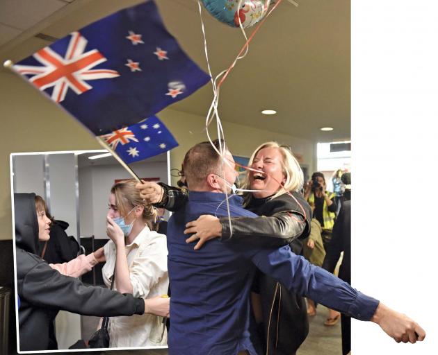 Melissa Jenner, of Queenstown, welcomes good friend Nate Dawes, of Sydney, at Queenstown Airport yesterday. Inset: Orlando de Torres, of Queenstown, is happy to see his older sister Chloe, who arrived from Sydney. PHOTOS: GREGOR RICHARDSON