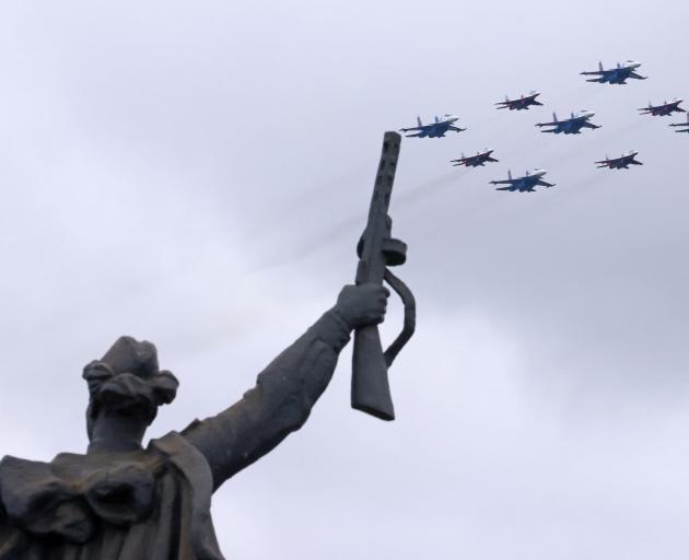 Russian jet fighters formation carry out a flypast, part of a military parade on Victory Day...