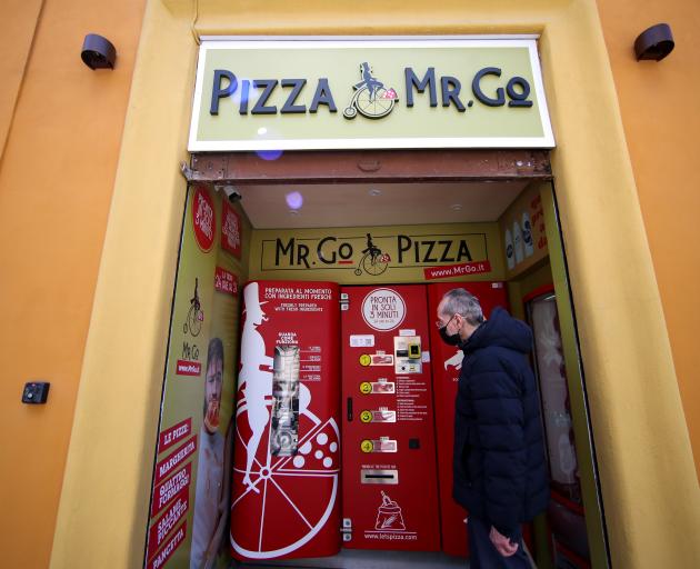 The first automatic pizza vending machine installed in the capital. Photo: Reuters